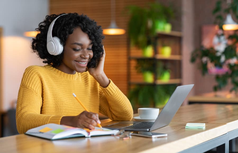 Woman with headset and working